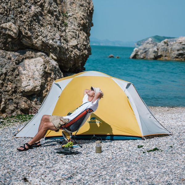 Стілець складаний Naturehike Moon YL08 NH20JJ027, 600D Oxford / алюміній, біло-помаранчевий 65487 фото